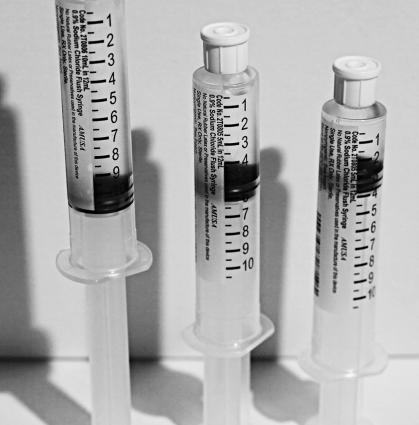 0.9% SODIUM CHLORIDE STERILE FIELD READY FLUSH SYRINGE, 10ML NDC 2S0706 ** STERILE FIELD ** NON-RETURNABLE